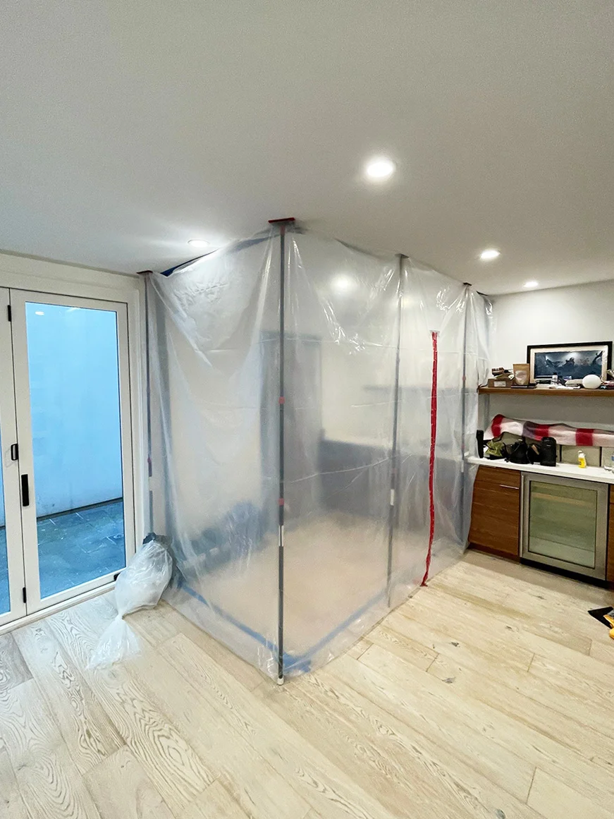 Plastic decontamination enclosure beside a work area — San Francisco, CA