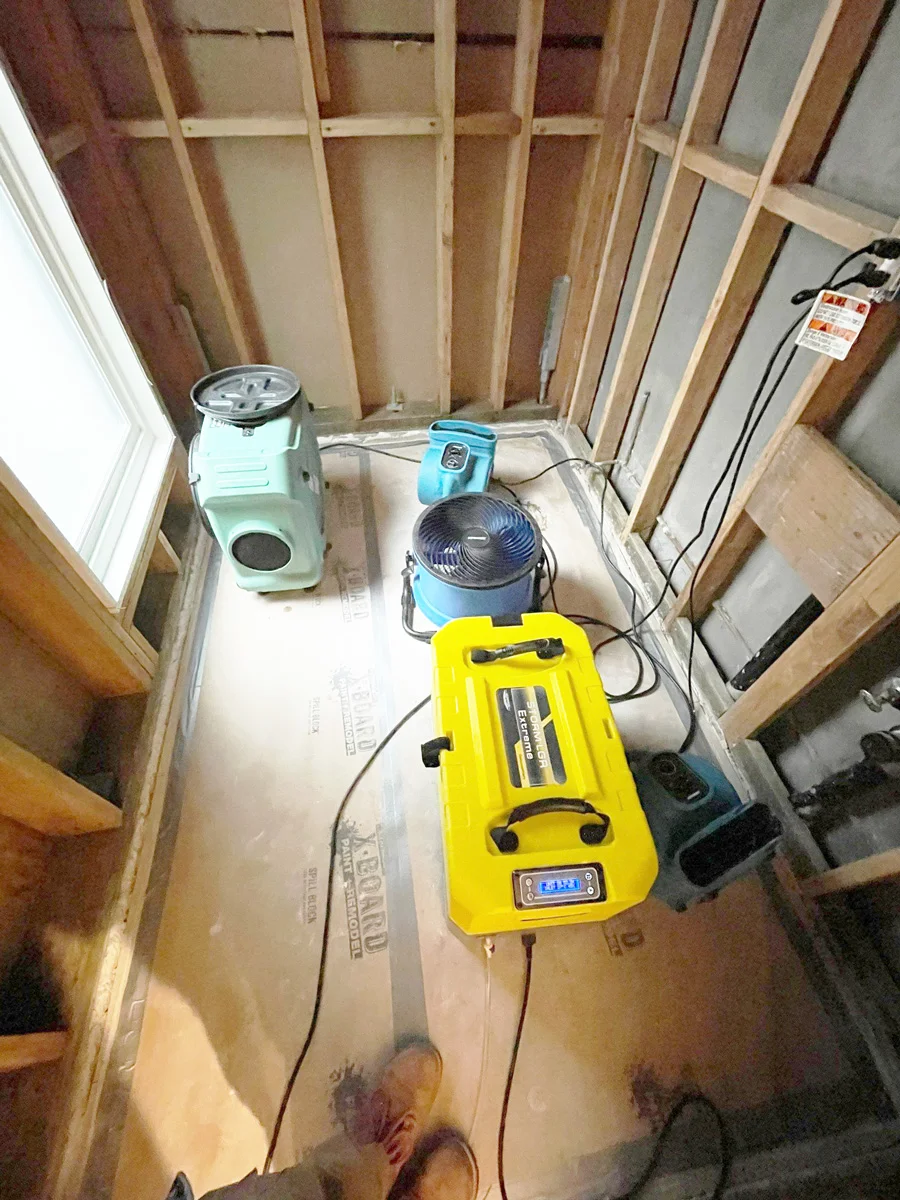 Dehumidifier and air movers in an opened wall enclosure — San Francisco, CA