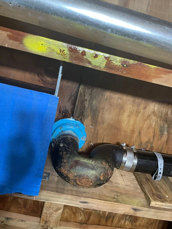 Close-up of plumbing exposed during leak investigation — San Francisco, CA