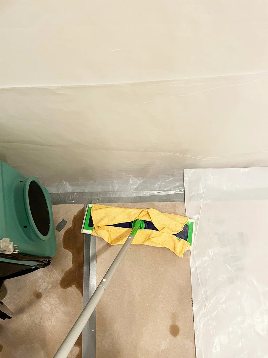 Cleaning an upper wall above a protected doorway — San Francisco, CA