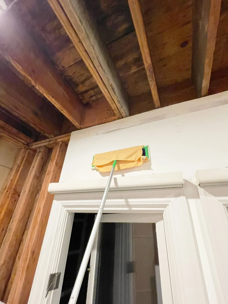 Opened ceiling and cleaning equipment above a protected door — San Francisco, CA