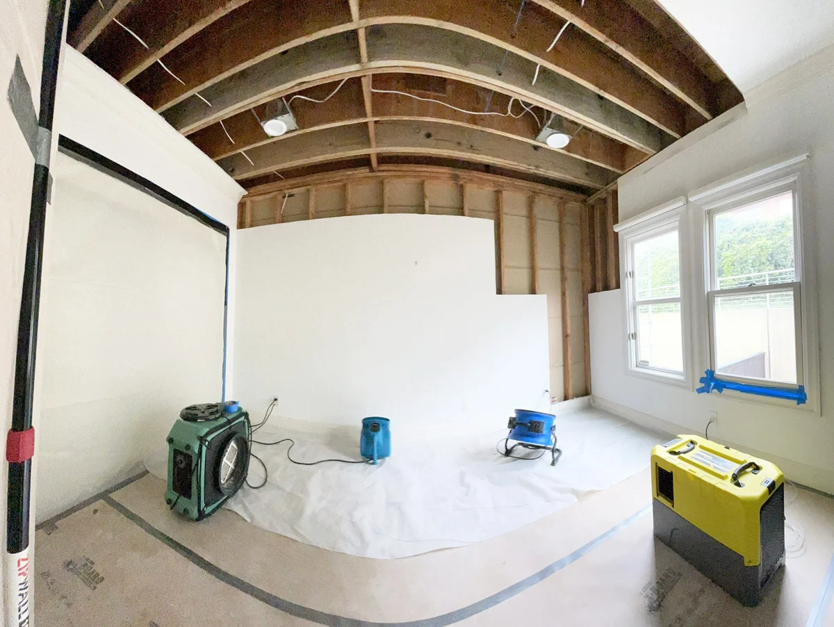 Air movers and a dehumidifier beneath an opened ceiling — San Francisco, CA