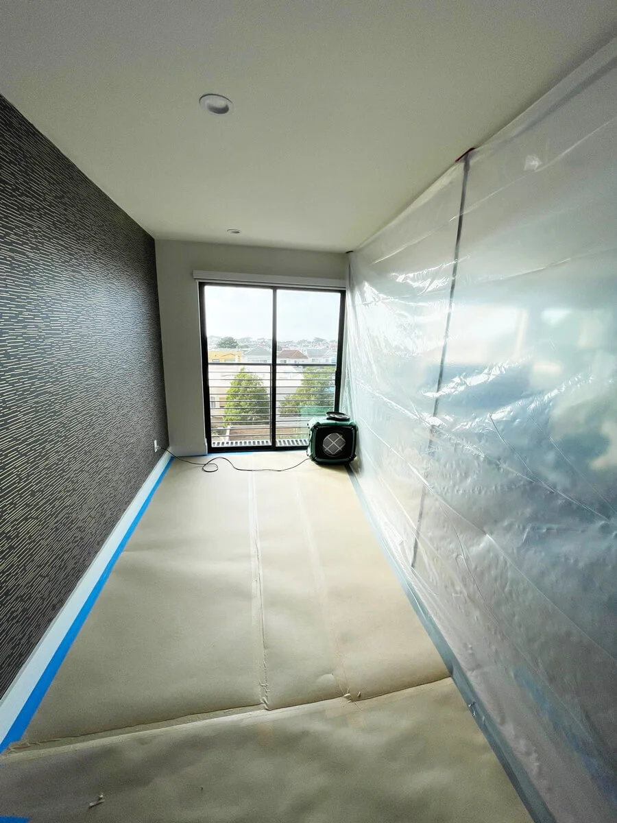 Floor protection laid along a contained work area — San Francisco, CA