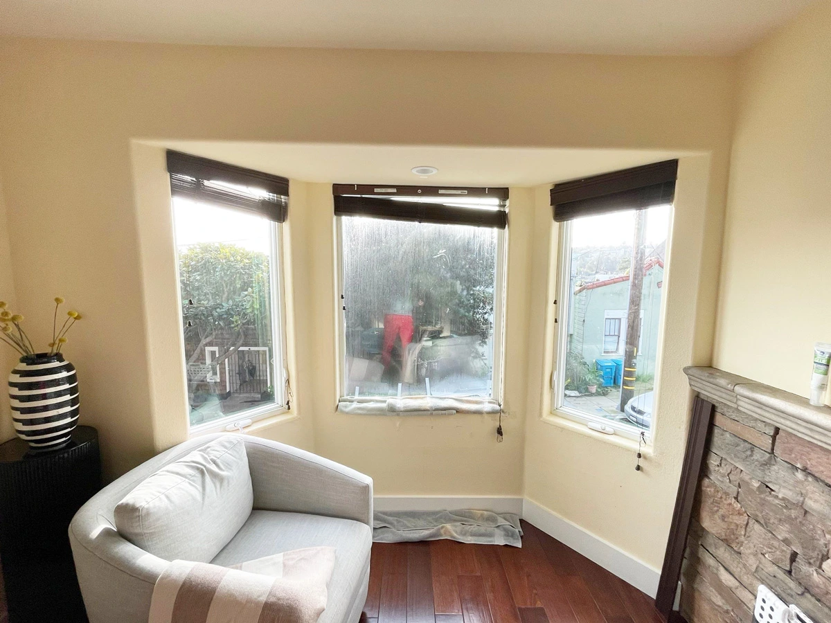 Living-room bay window before water damage repairs — San Francisco, CA