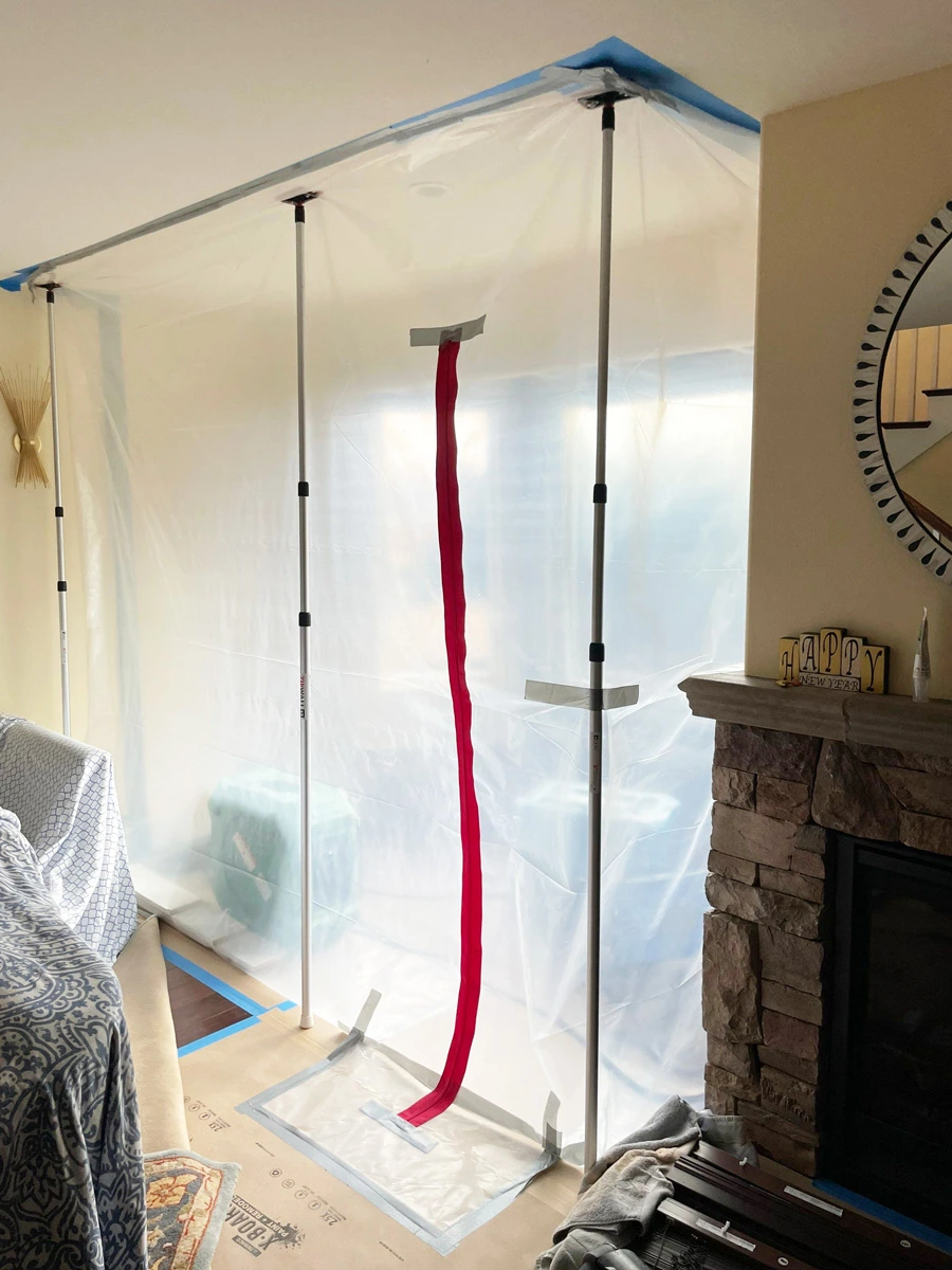 Zippered plastic containment around a bay-window work area — San Francisco, CA