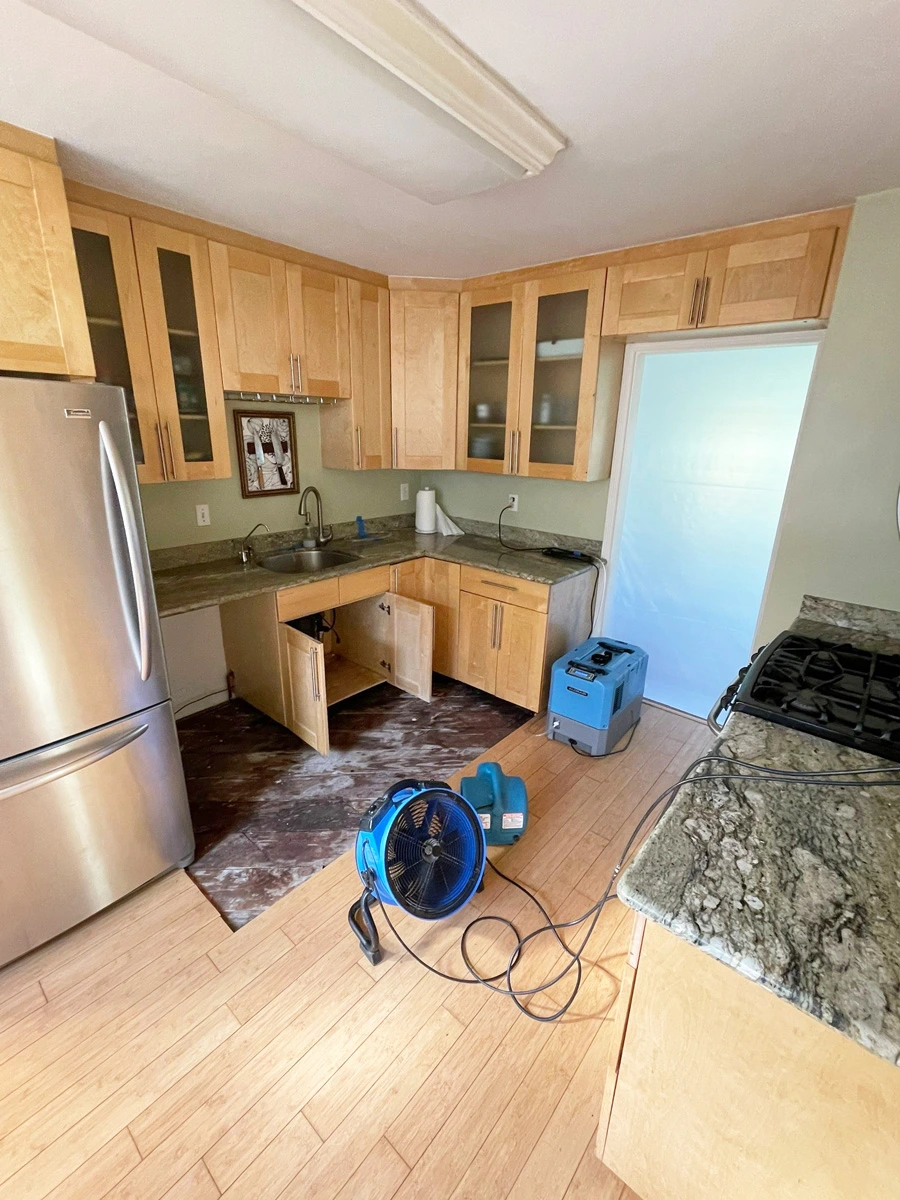 Air mover and dehumidifier drying a kitchen — San Francisco, CA